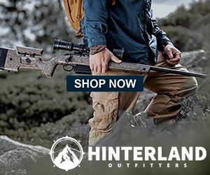 A person standing in a natural outdoor setting, holding a rifle, wearing outdoor clothing, with a 'SHOP NOW' banner for Hinterland Outfitters.